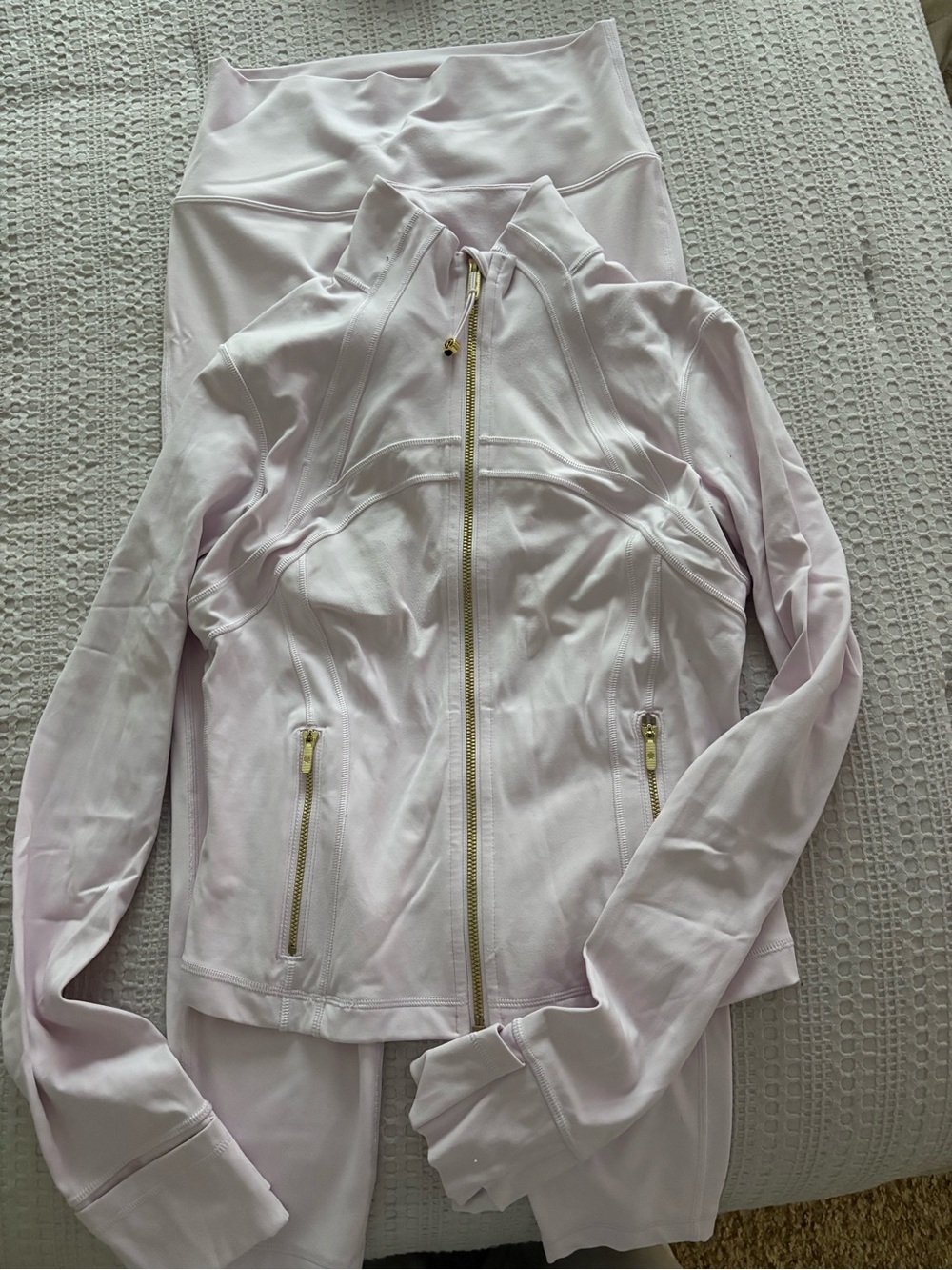 Pink Lululemon define set with gold hardware